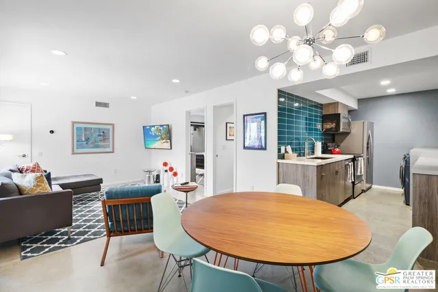 a view of a dining room with furniture