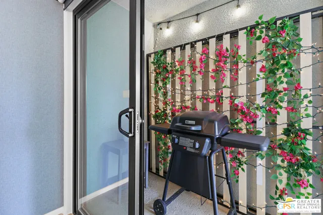 a view of a entryway with flower pots