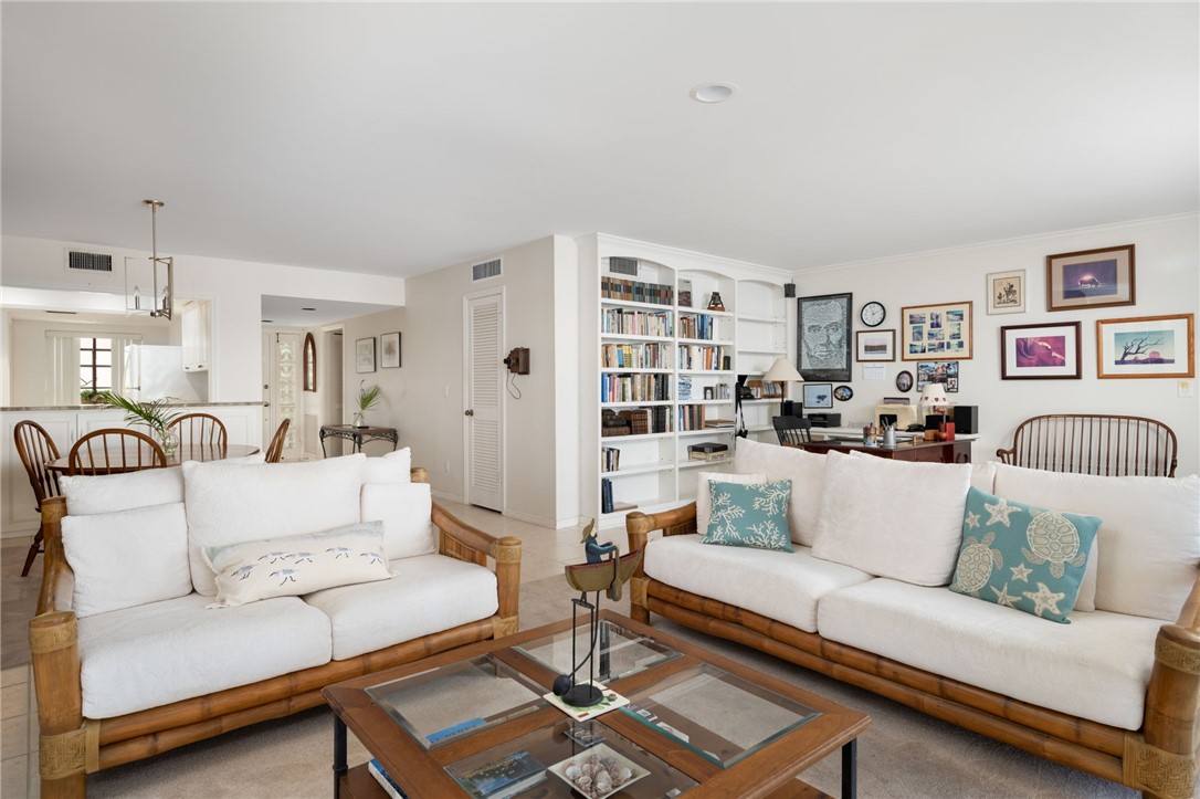 1870 Bay Road, Unit 213G Vero Beach, FL 32963 - Photo 14 of 36 a living room with furniture and a couch