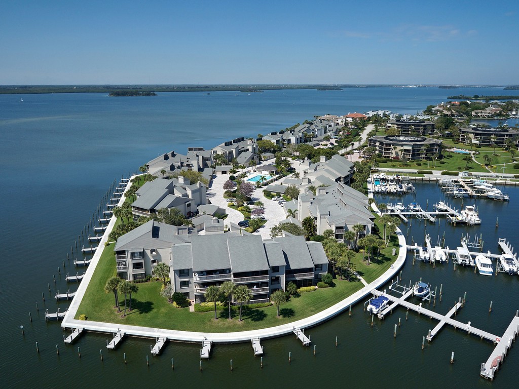 1870 Bay Road, Unit 213G Vero Beach, FL 32963 - Photo 23 of 36 an aerial view of a residential houses with outdoor space and seating