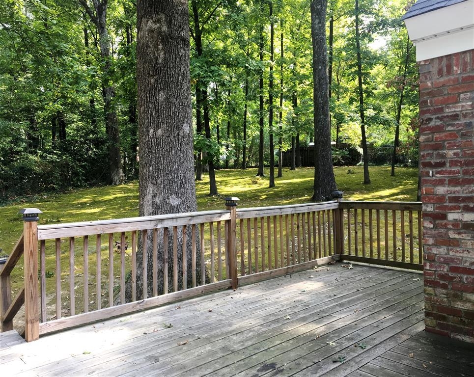 5482 North Rolling Oaks Drive Memphis, TN 38119 - Photo 2 of 4 a balcony with wooden floor
