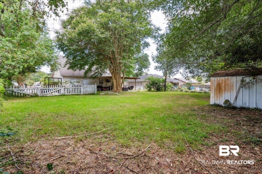 3616 Vista Ridge Drive Mobile, AL 36693 - Photo 18 of 20 View of yard with a storage shed