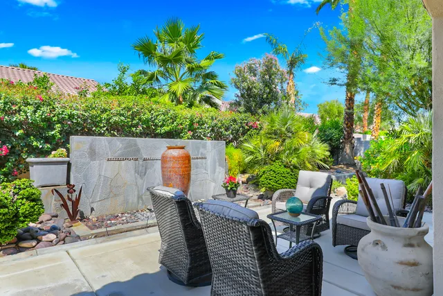 a view of a tree with yard