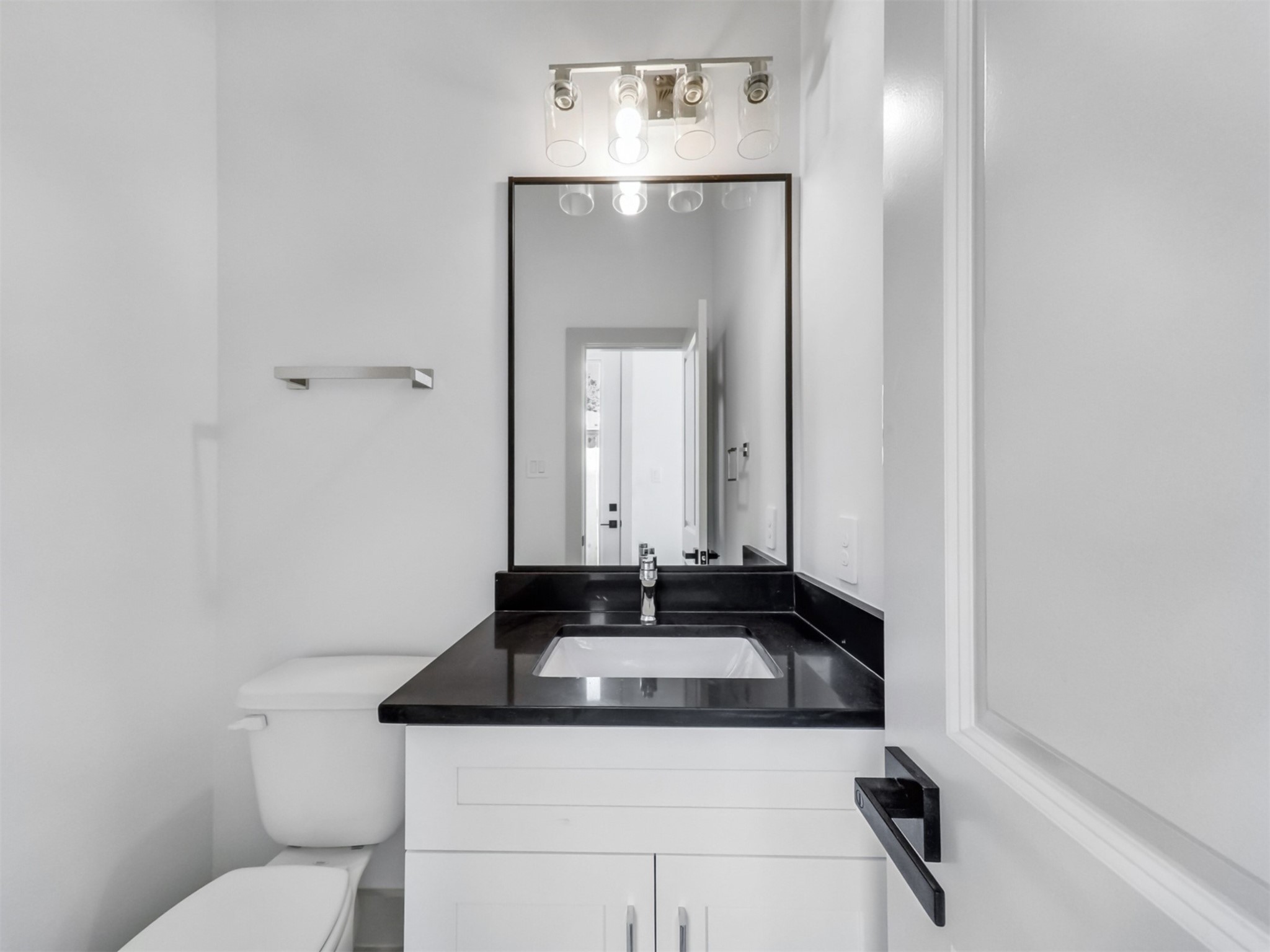 2410 Vaughn Street, Unit B Houston, TX 77093 - Photo 5 of 26 half bath featuring stylish finishes