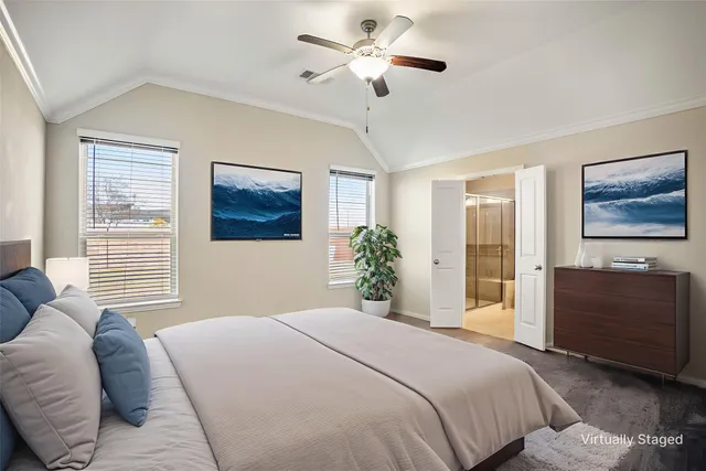 a view of an empty room and a ceiling fan