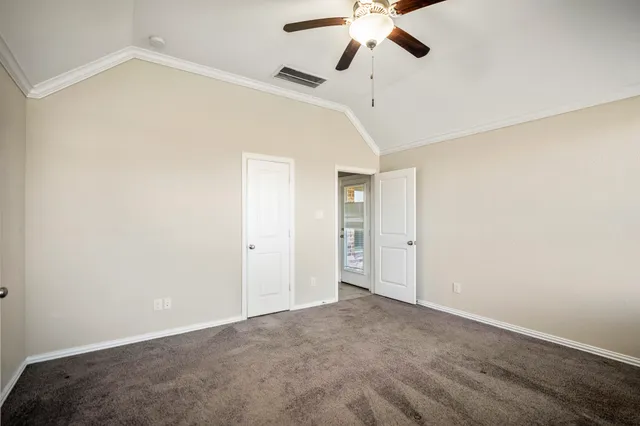 a bathroom with a granite countertop sink mirror and shower