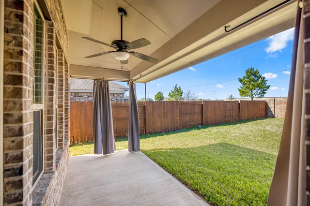 a view of a porch with a door