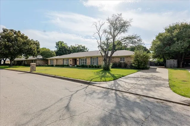 a view of a house with a swimming pool