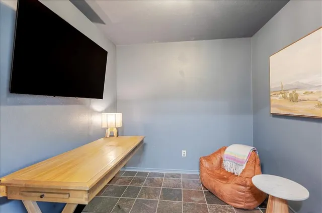 a bathroom with a toilet and a sink