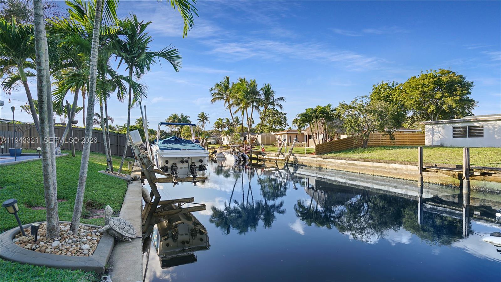 5921 Southwest 17th Street Plantation, FL 33317 - Photo 45 of 53 a view of a yard and swimming pool