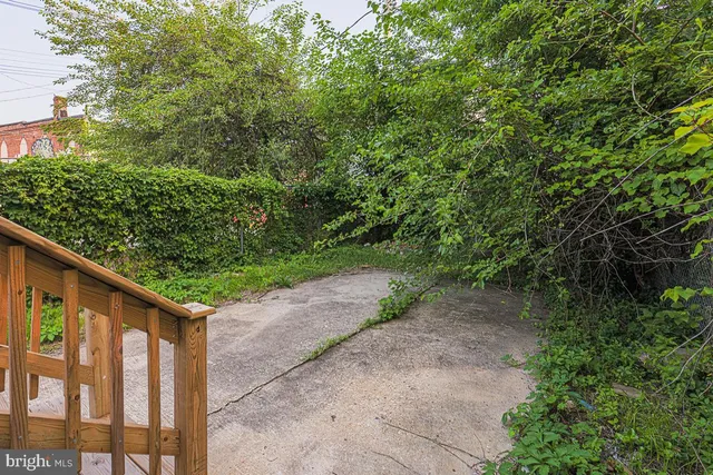 a car parked in front of a house