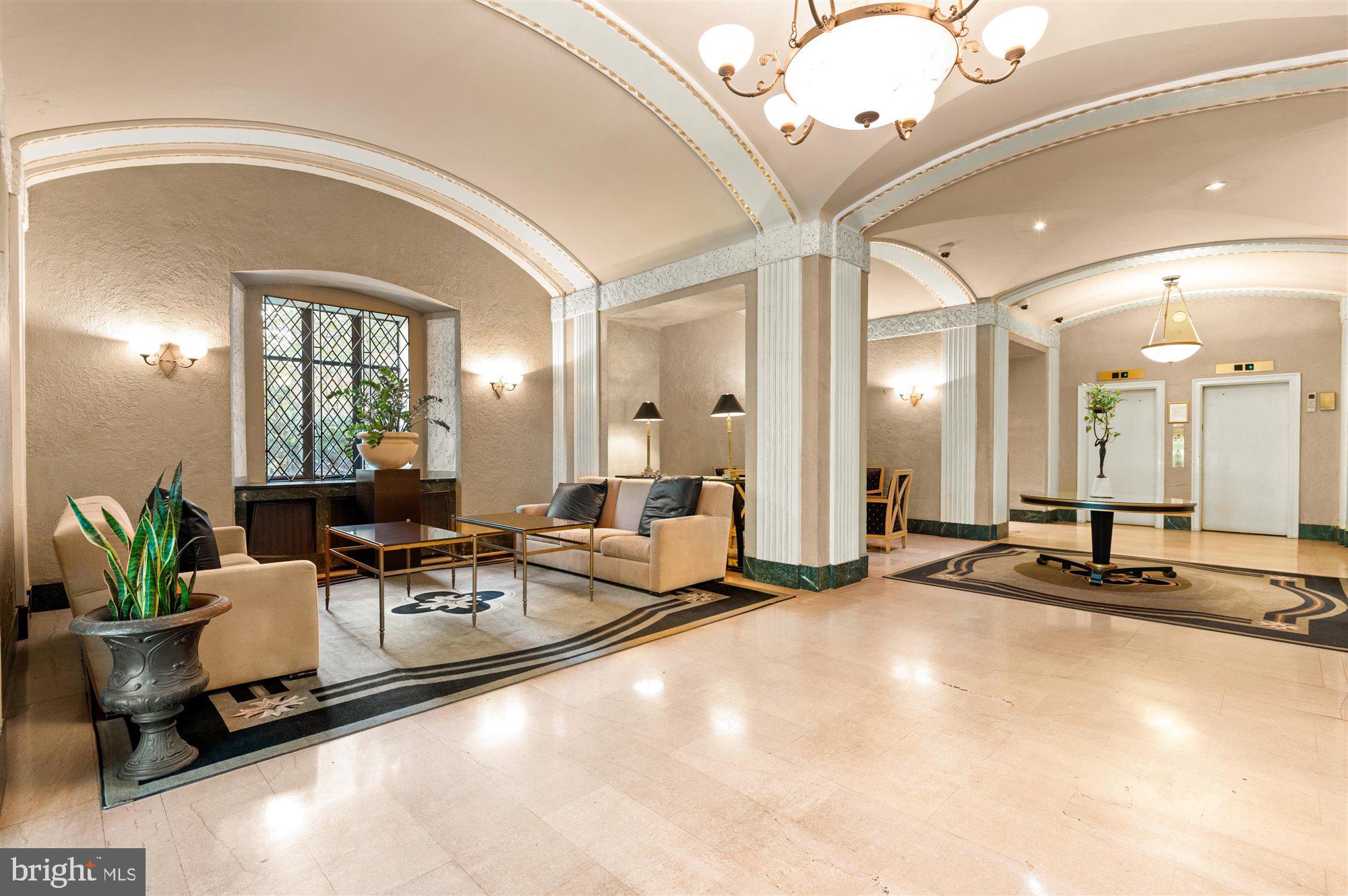 2032 Belmont Road Northwest, Unit 311 Washington, DC 20009 - Photo 17 of 31 Building lobby w/ staffed front desk