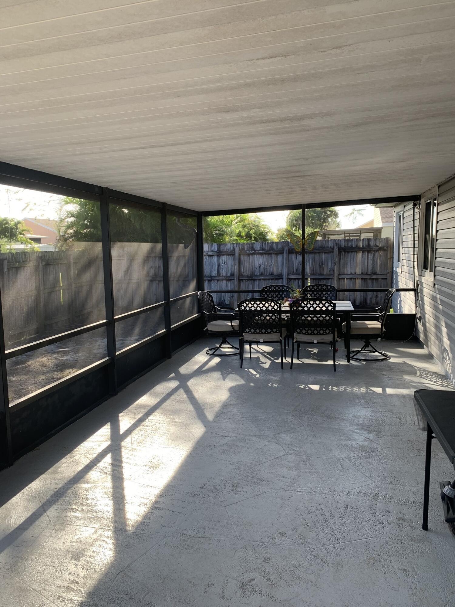 8438 Dynasty Drive Boca Raton, FL 33433 - Photo 30 of 34 Large Screened Patio