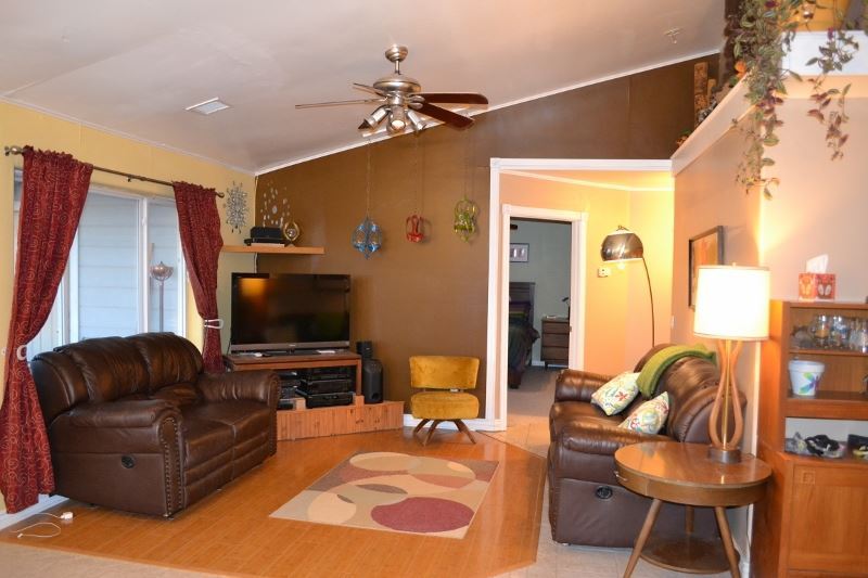 1052 West 8th S Street Snowflake, AZ 85937 - Photo 15 of 36 a living room with furniture and a flat screen tv