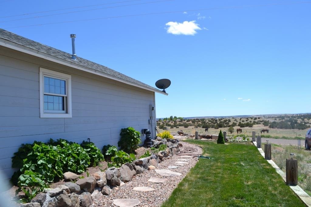 1052 West 8th S Street Snowflake, AZ 85937 - Photo 6 of 36 a view of a yard with a pathway