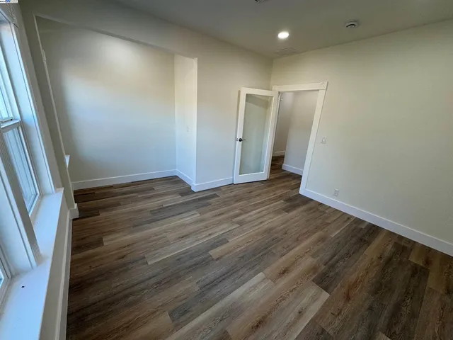 a view of an empty room and window