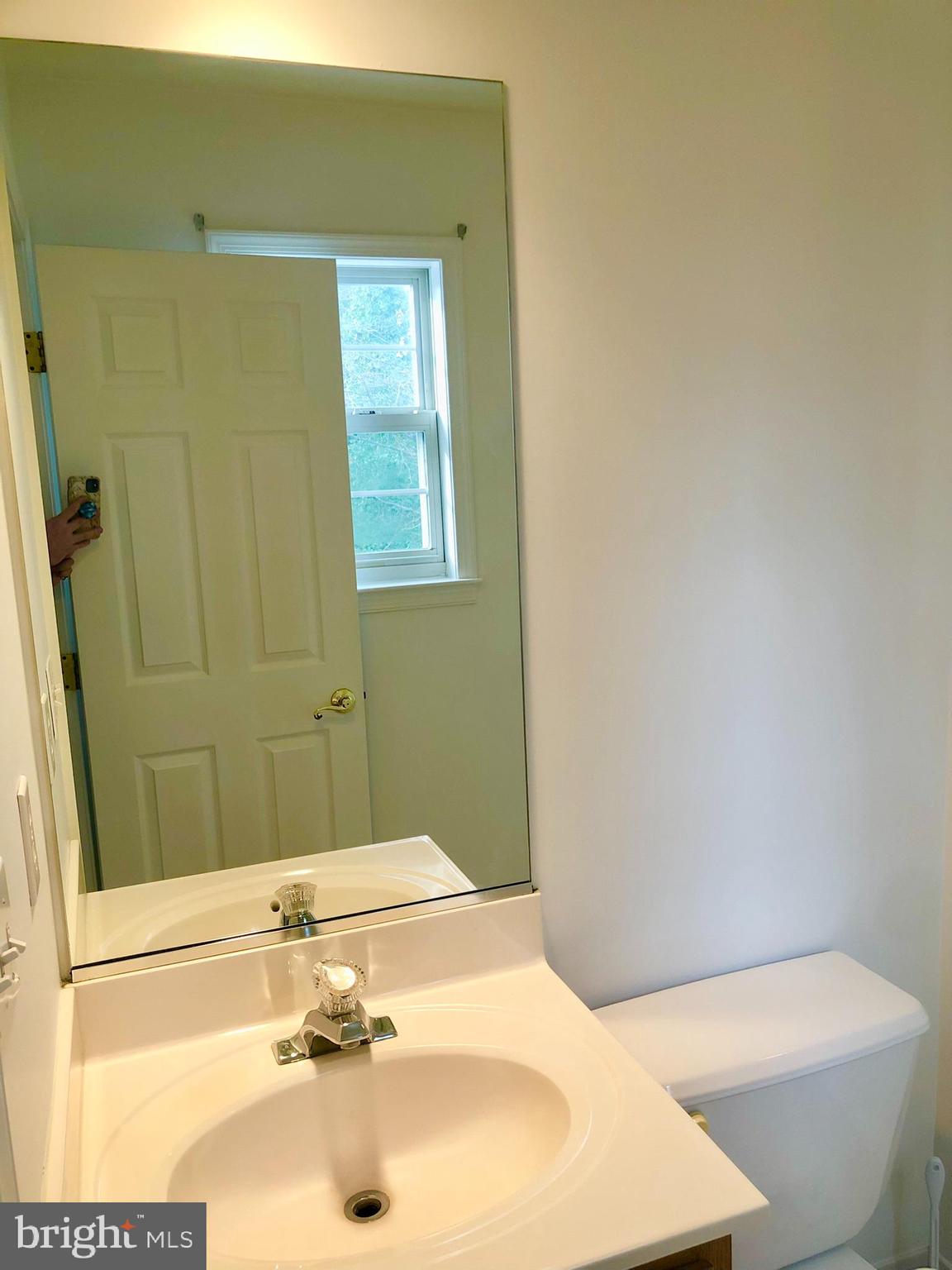 359 Freshfield Lane Arnold, MD 21012 - Photo 11 of 22 a bathroom with a sink and a tub
