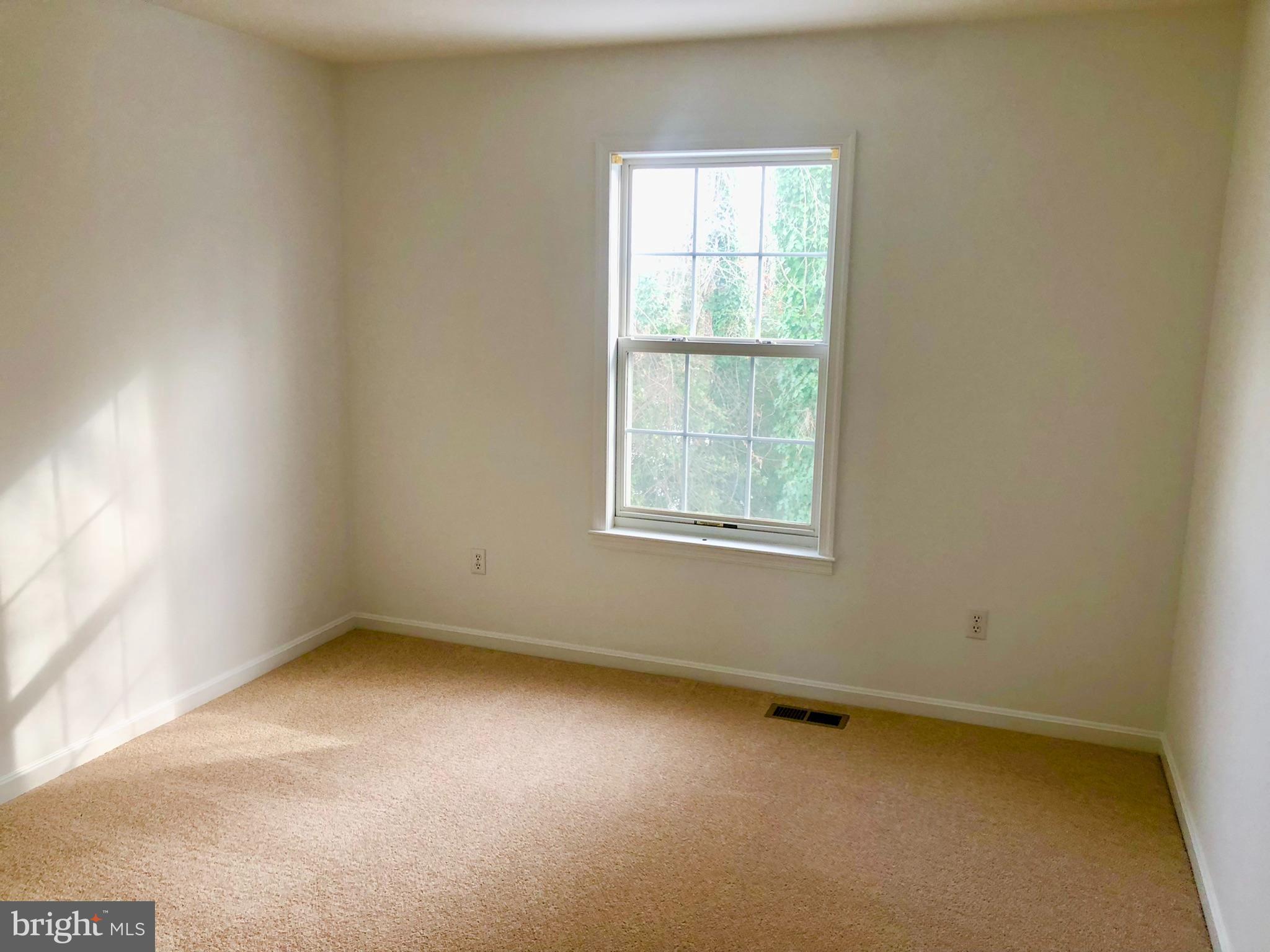 359 Freshfield Lane Arnold, MD 21012 - Photo 14 of 22 an empty room with a window