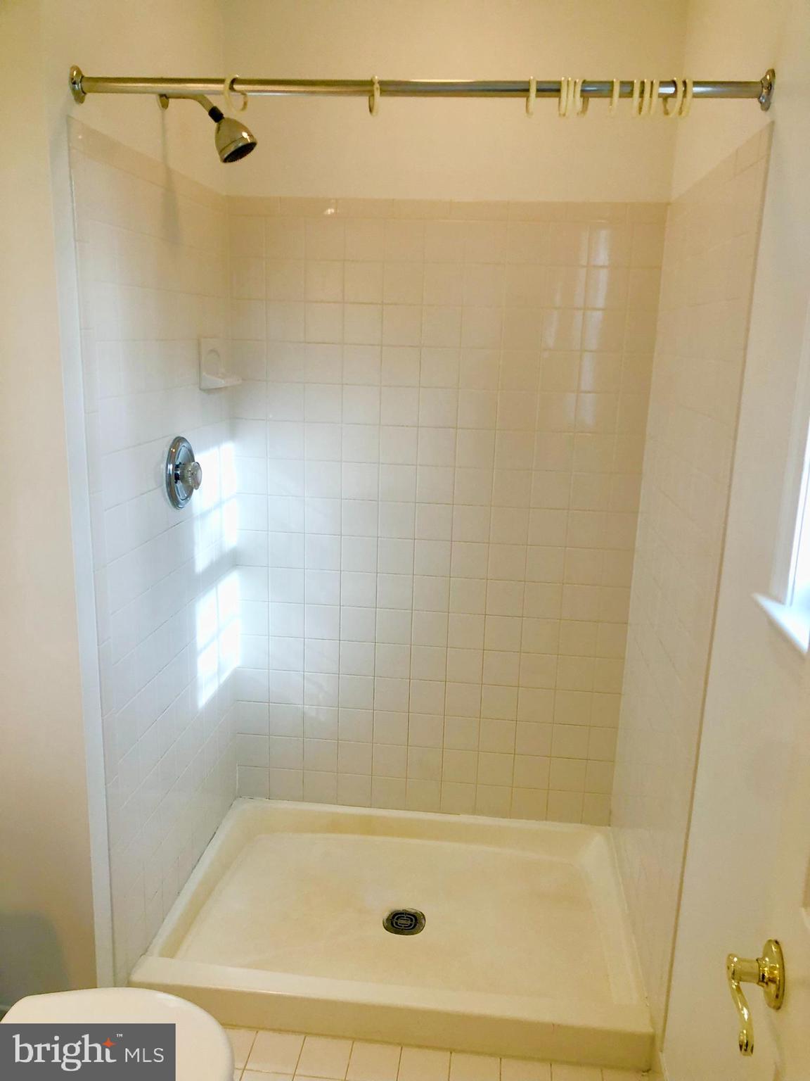 359 Freshfield Lane Arnold, MD 21012 - Photo 17 of 22 a bathroom with a shower and a shower