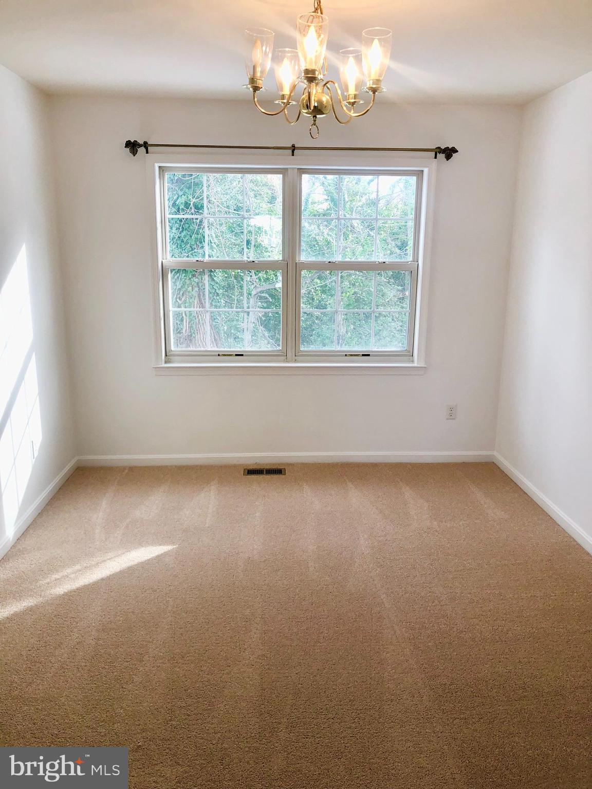 359 Freshfield Lane Arnold, MD 21012 - Photo 5 of 22 an empty room with a window