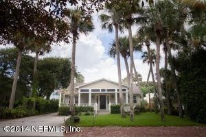 310 7th Street Atlantic Beach, FL 32233 - Photo 3 of 37 a front view of a house with a garden