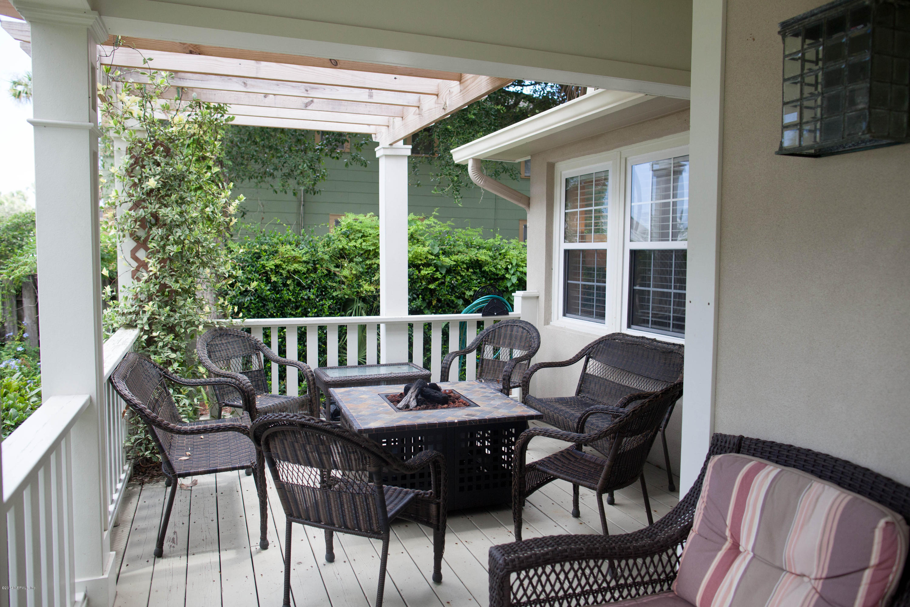310 7th Street Atlantic Beach, FL 32233 - Photo 21 of 37 a view of a chairs and table in the balcony