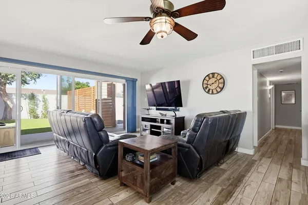 a living room with furniture and a window