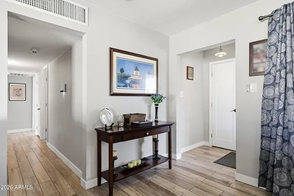 a view of a hallway with workspace