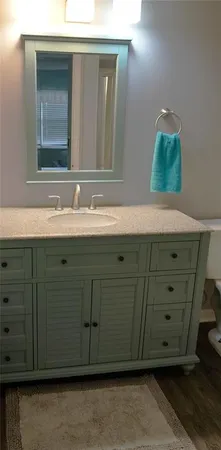 a view of an empty room with furniture