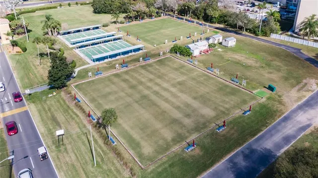 an aerial view of a house with a swimming pool