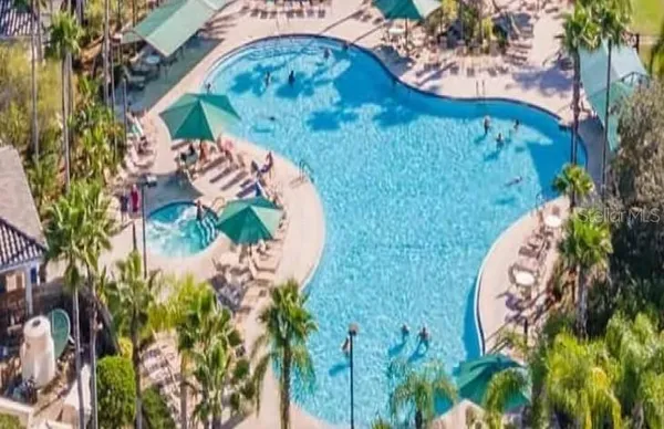 a view of an outdoor space pool patio and outdoor seating
