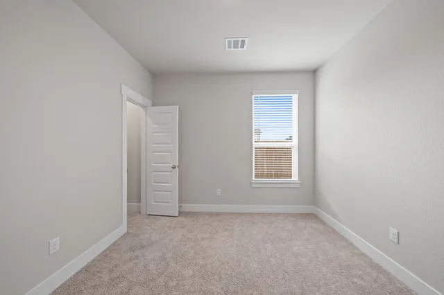 a view of empty room with window