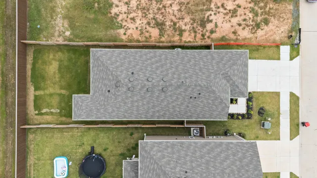 view of a brick house with a outdoor space