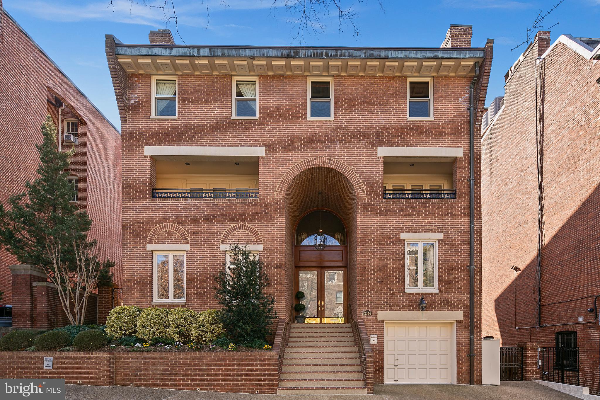 Beautiful detached brick residence with parking