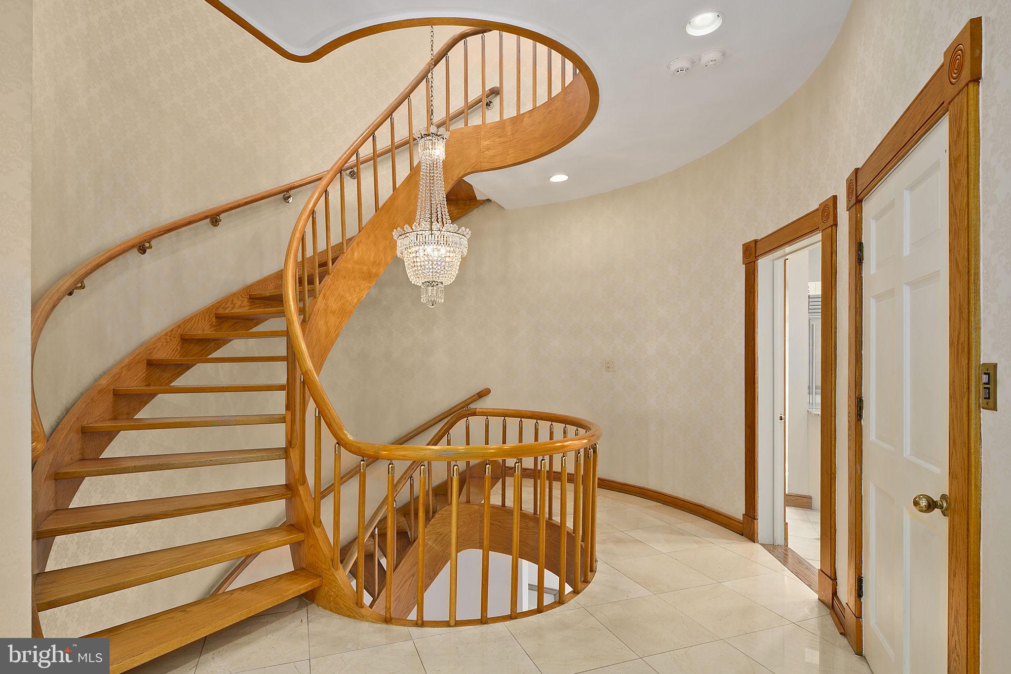 2344 S Street Northwest Washington, DC 20008 - Photo 12 of 52 Dramatic spiral staircase with elevator