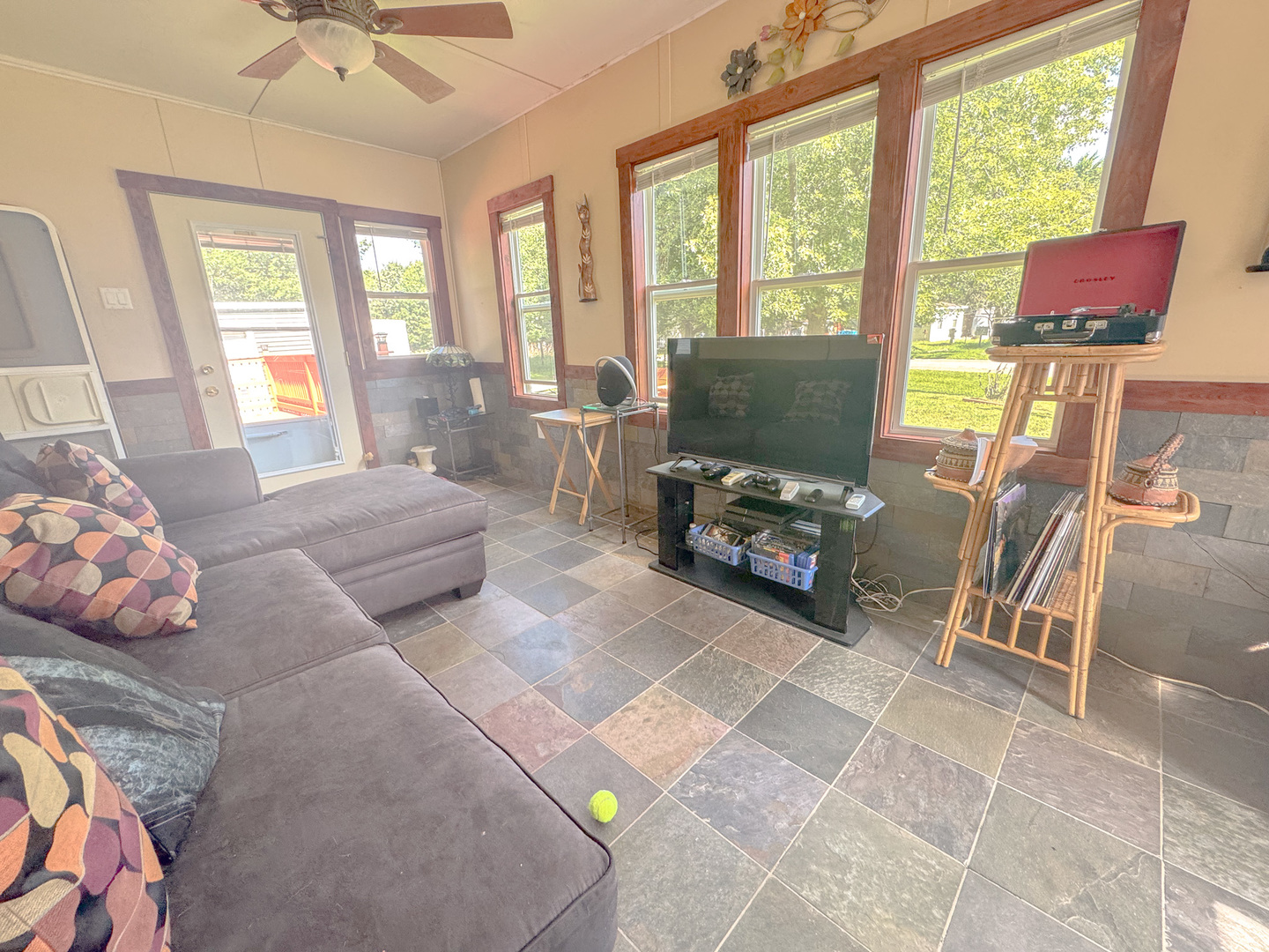 9-219 Woodhaven Sublette, IL 61367 - Photo 13 of 17 a living room with furniture and a flat screen tv
