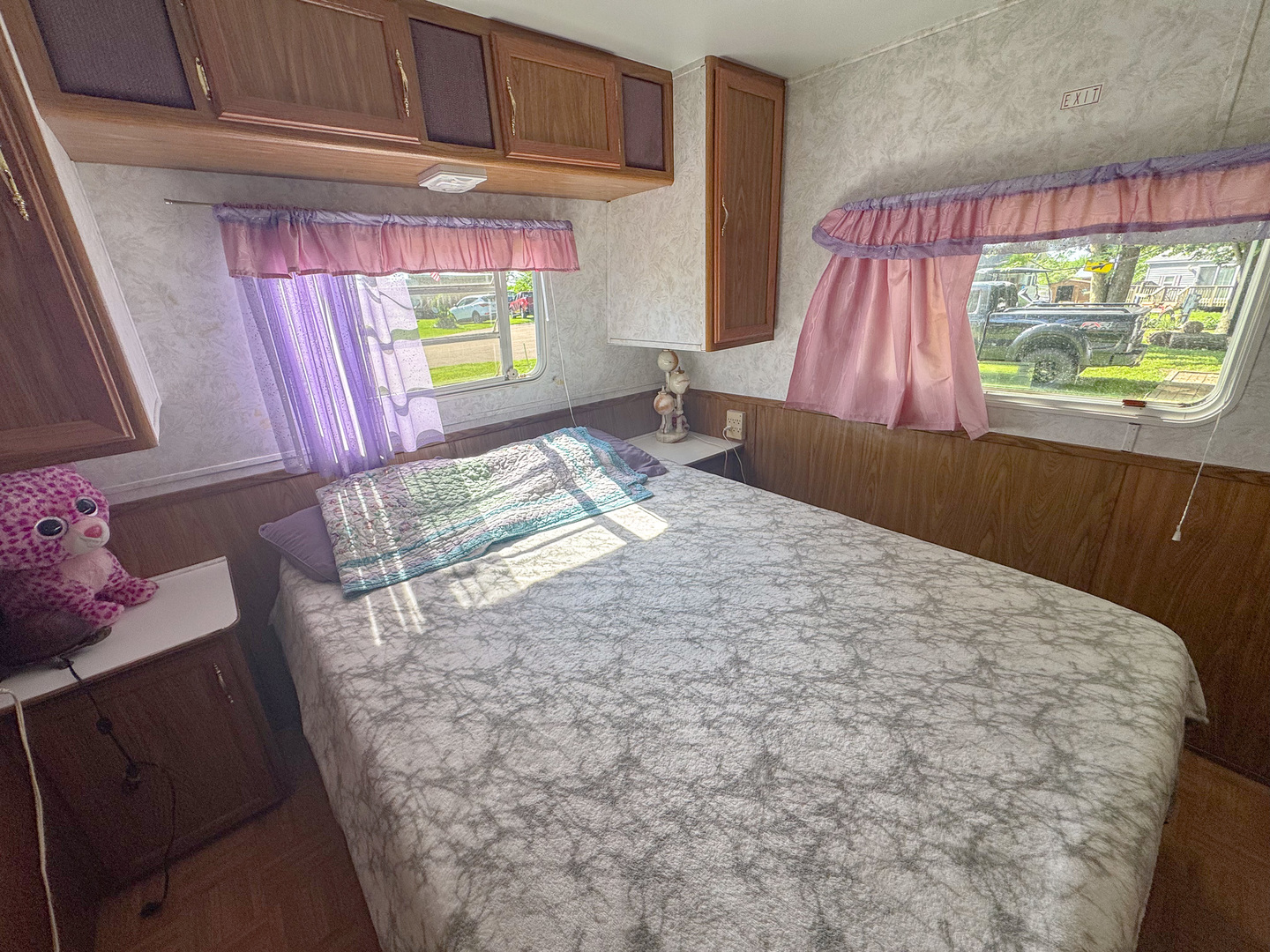 9-219 Woodhaven Sublette, IL 61367 - Photo 15 of 17 a bedroom with a bed and a window