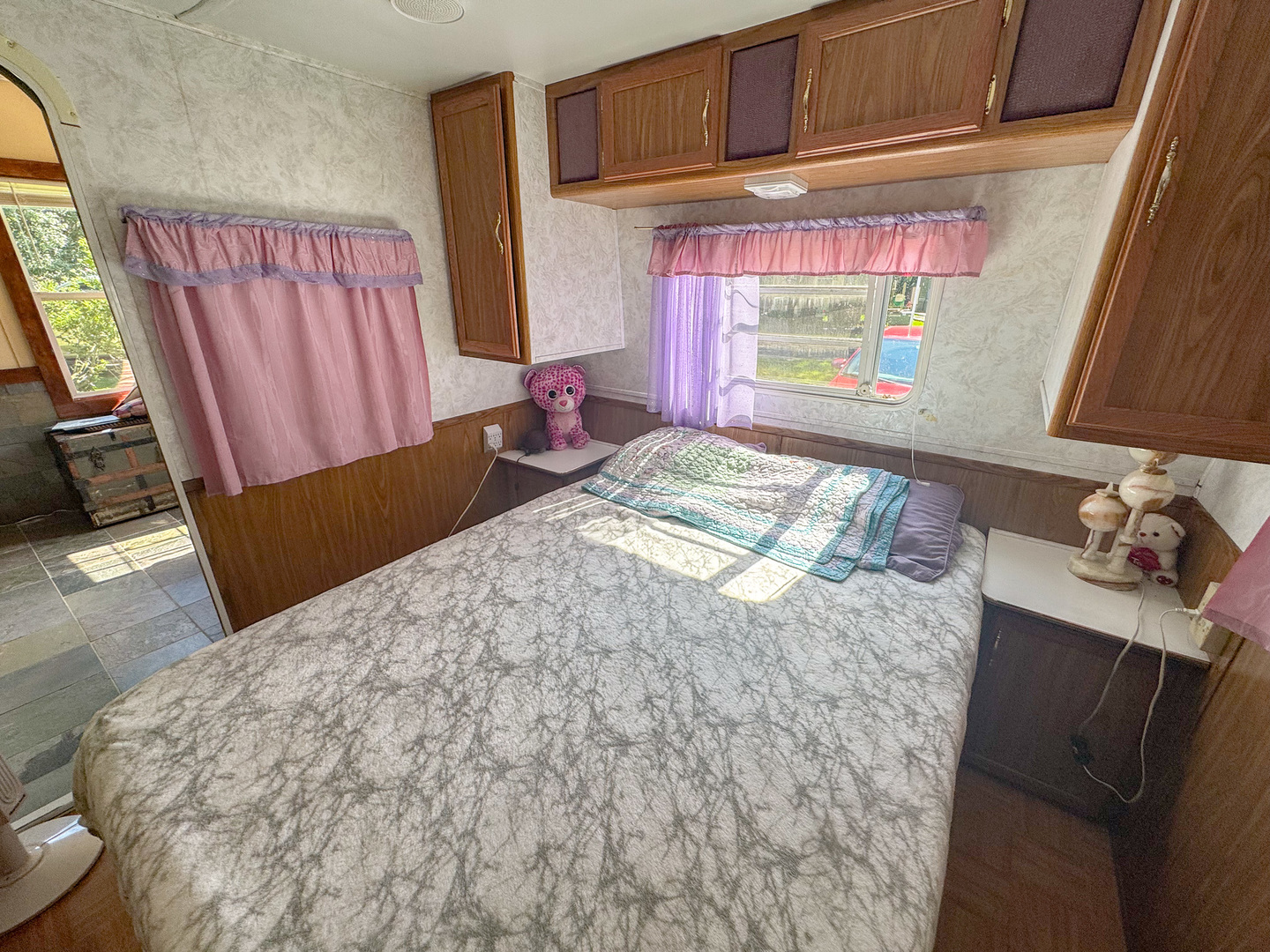 9-219 Woodhaven Sublette, IL 61367 - Photo 16 of 17 a bedroom with a bed and a window