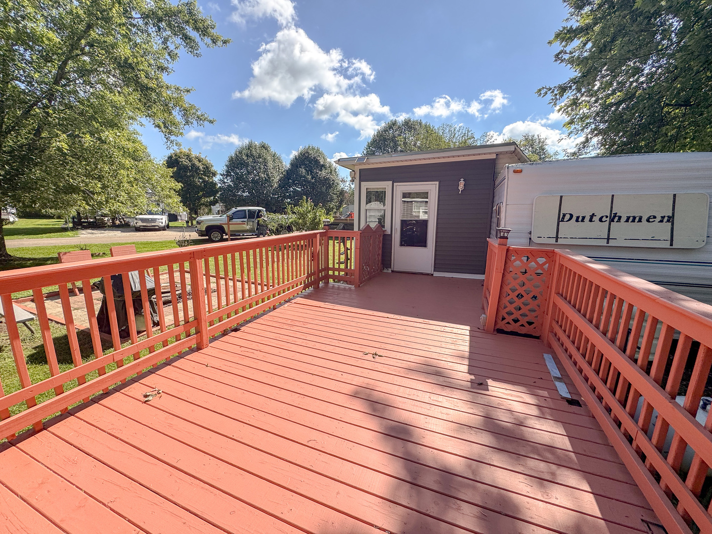 9-219 Woodhaven Sublette, IL 61367 - Photo 3 of 17 a view of a house with deck and wooden floor