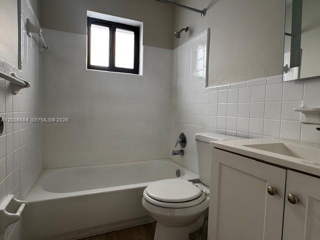 1310 West 29th Street, Unit 22 Hialeah, FL 33012 - Photo 16 of 16 a bathroom with a sink a toilet and shower