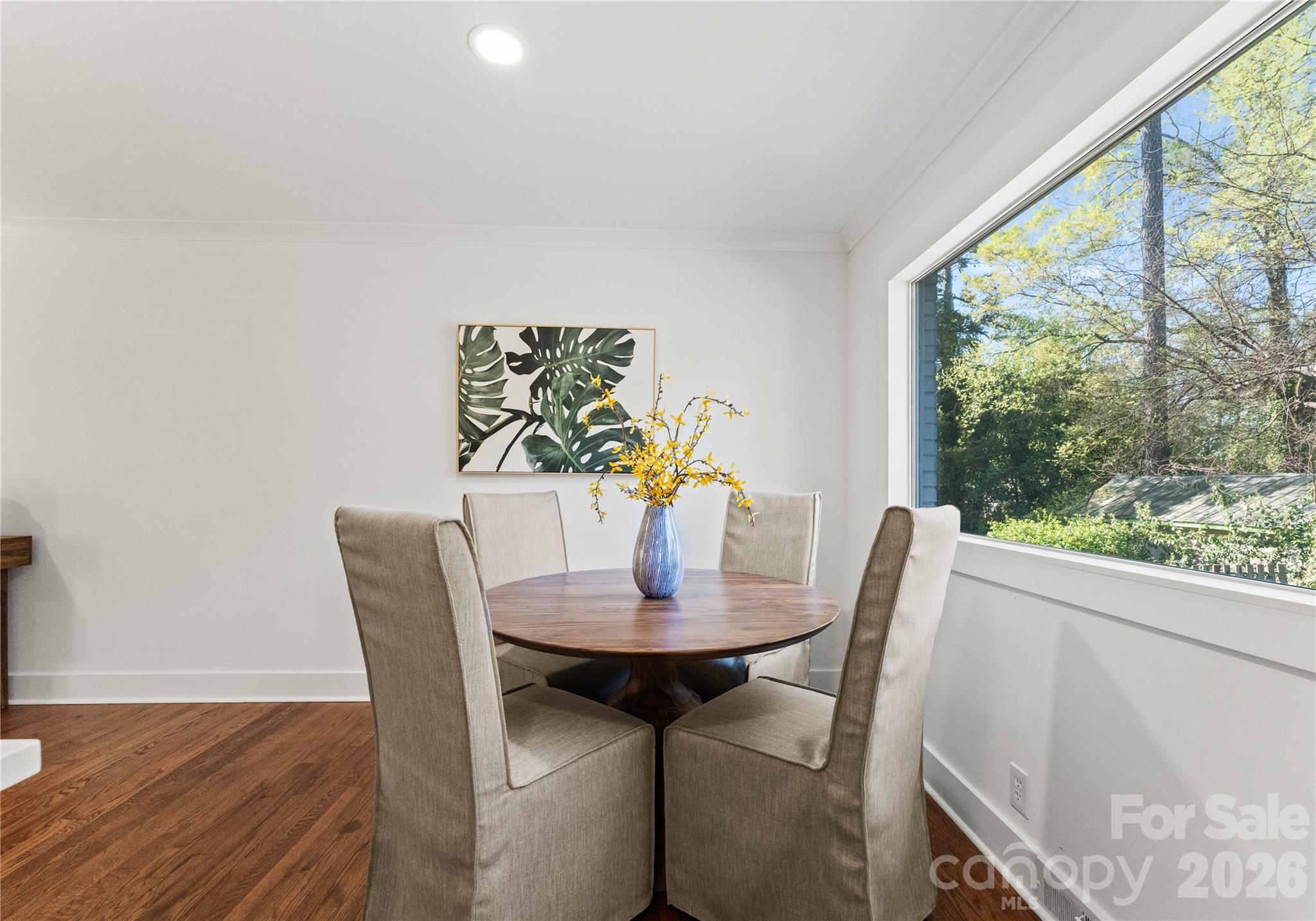 5100 White Oak Road Charlotte, NC 28210 - Photo 13 of 43 a dining room with furniture and wooden floor