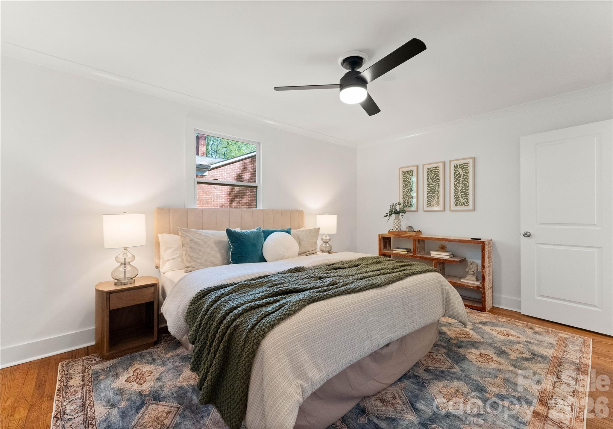 5100 White Oak Road Charlotte, NC 28210 - Photo 18 of 43 a bedroom with a bed and a painting on the wall