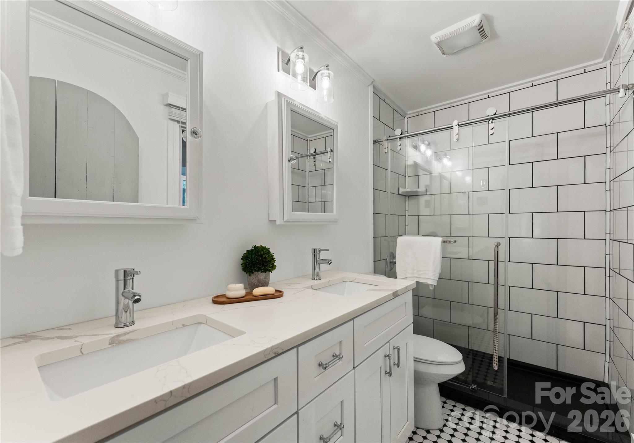 5100 White Oak Road Charlotte, NC 28210 - Photo 20 of 43 a bathroom with a sink toilet and shower