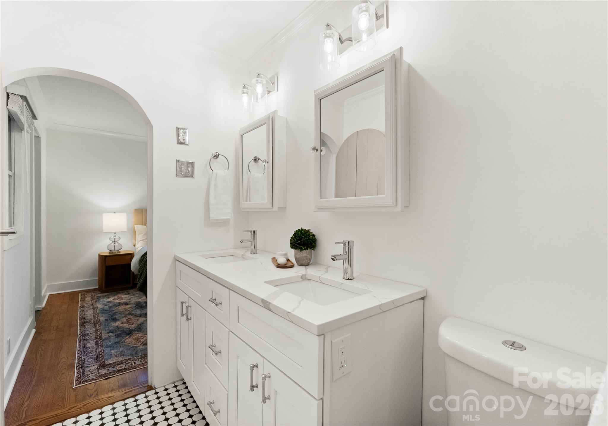 5100 White Oak Road Charlotte, NC 28210 - Photo 22 of 43 a bathroom with a sink a toilet and mirror