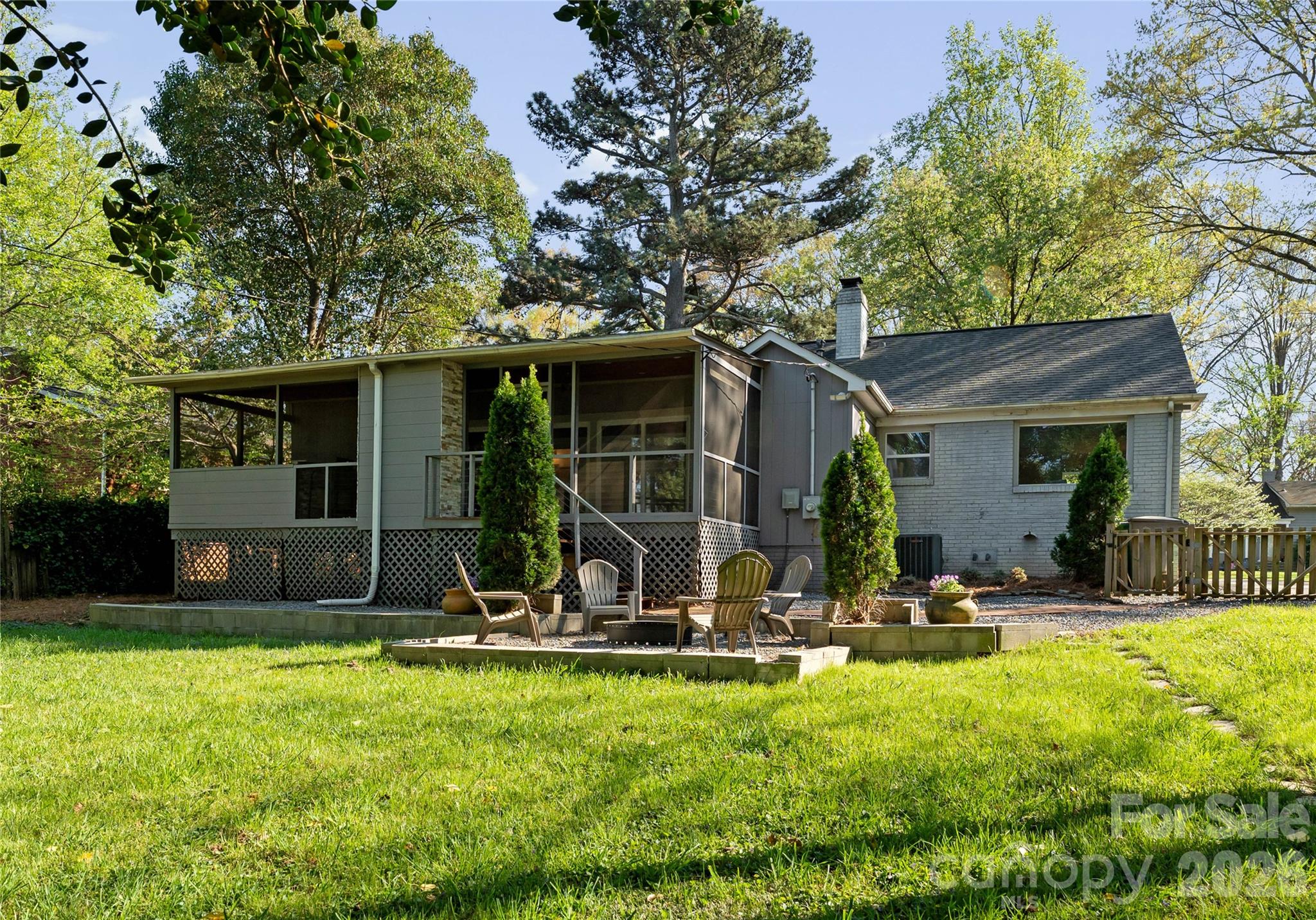 5100 White Oak Road Charlotte, NC 28210 - Photo 38 of 43 a view of a house with backyard porch and sitting area