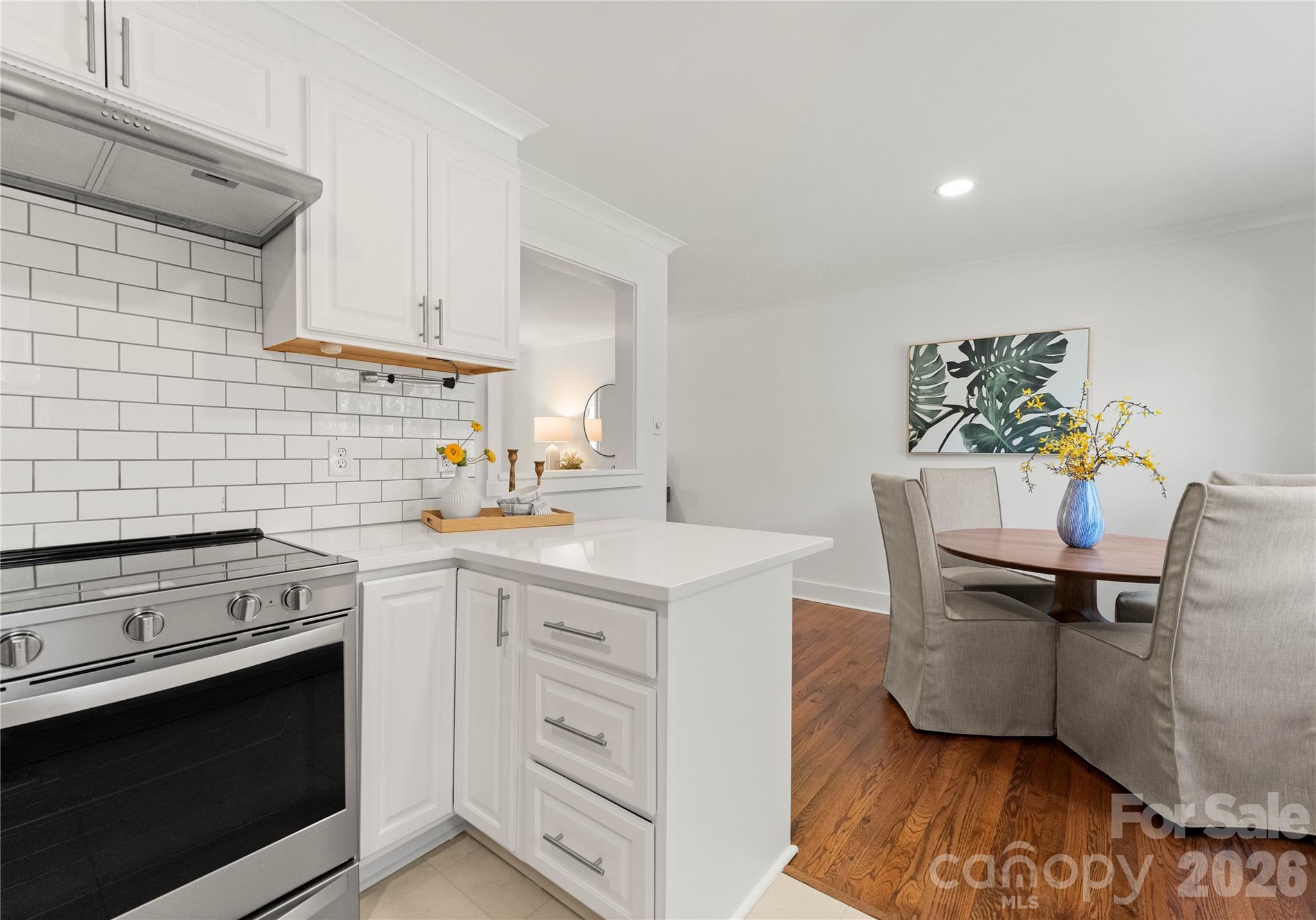5100 White Oak Road Charlotte, NC 28210 - Photo 8 of 43 a kitchen with stainless steel appliances a stove a sink and a refrigerator