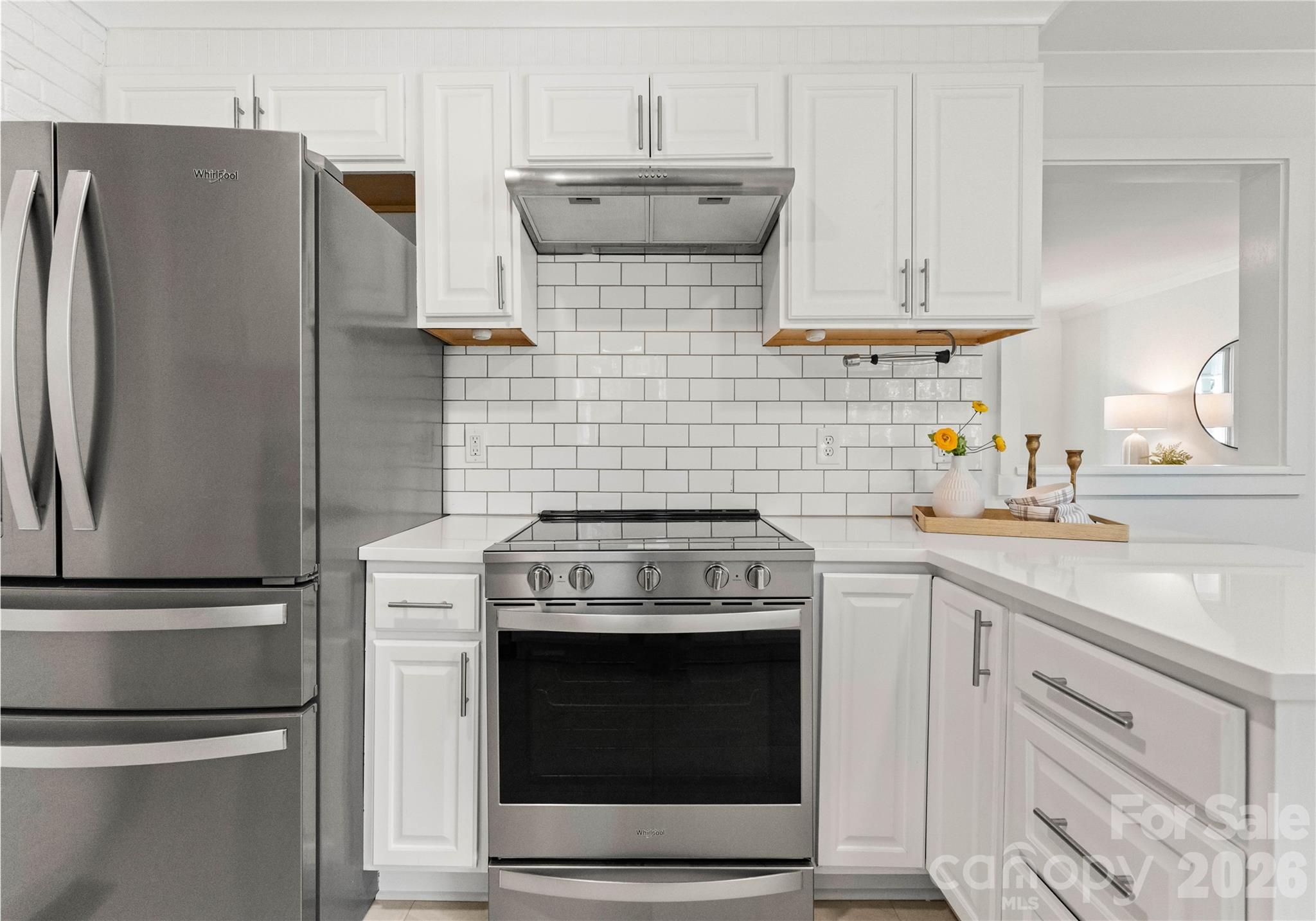 5100 White Oak Road Charlotte, NC 28210 - Photo 9 of 43 a kitchen with stainless steel appliances and cabinets