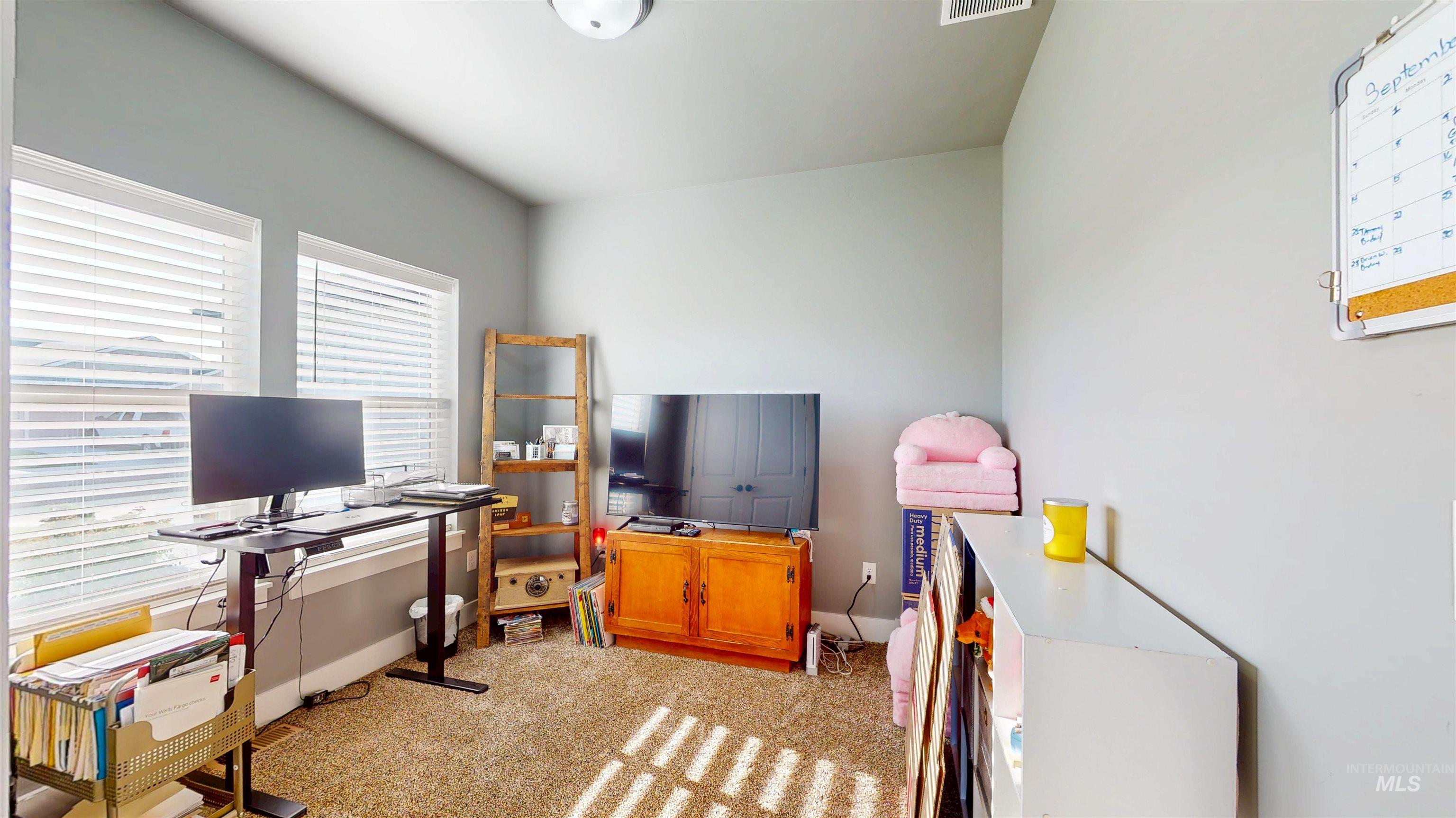 946 Kenbrook Loop Twin Falls, ID 83301 - Photo 20 of 35 Office space featuring plenty of natural light and light colored carpet