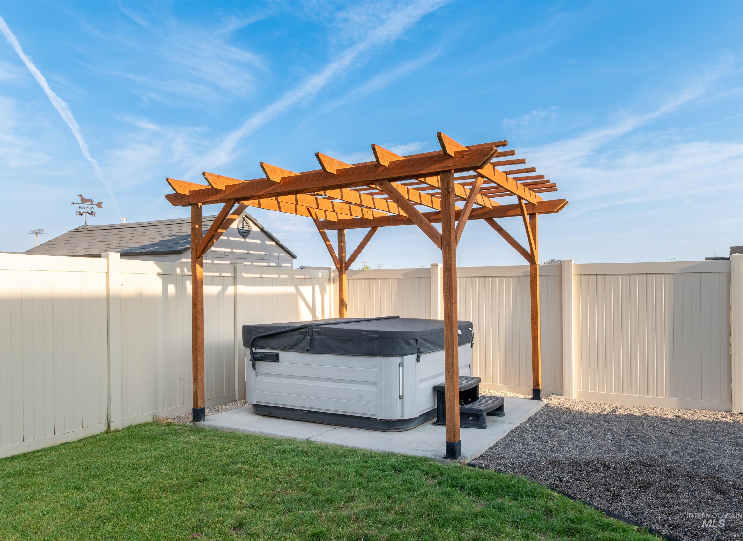 946 Kenbrook Loop Twin Falls, ID 83301 - Photo 26 of 35 View of parking / parking lot with a fenced backyard