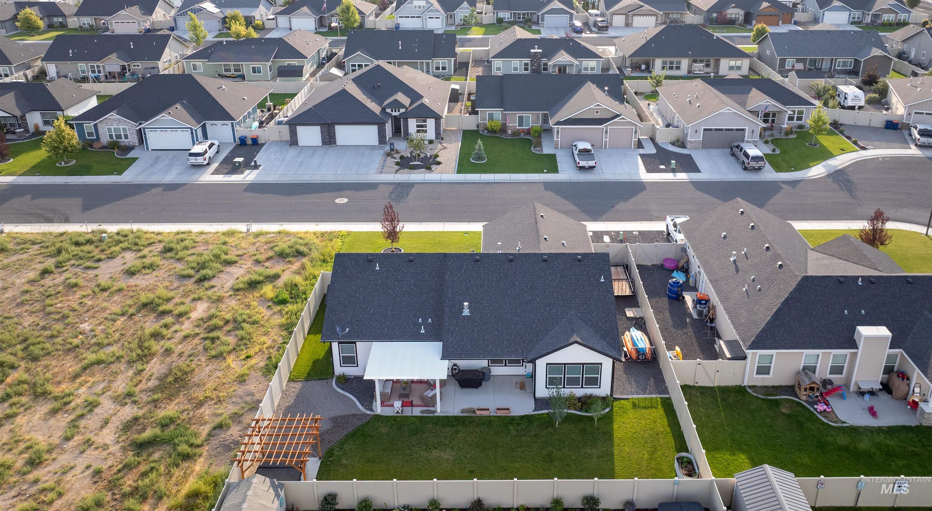 946 Kenbrook Loop Twin Falls, ID 83301 - Photo 32 of 35 Aerial perspective of suburban area